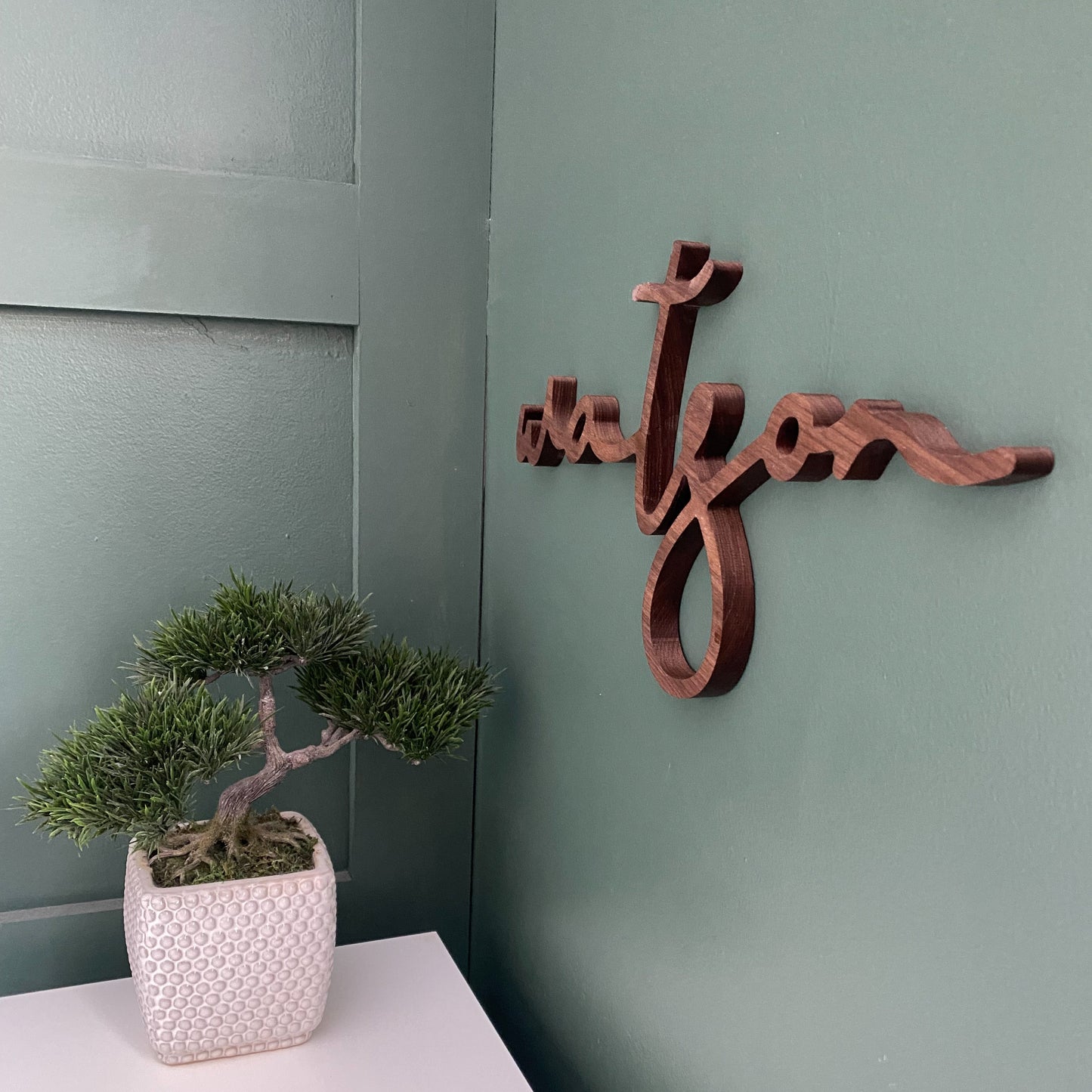boy nursery with walnut sign