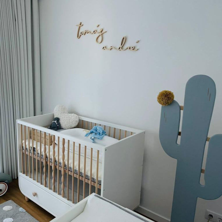 boy nursery design with wooden name script