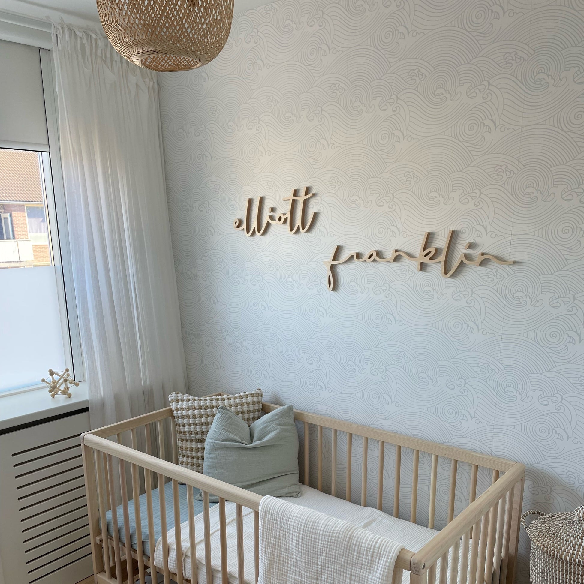 boy nursery with wooden name sign