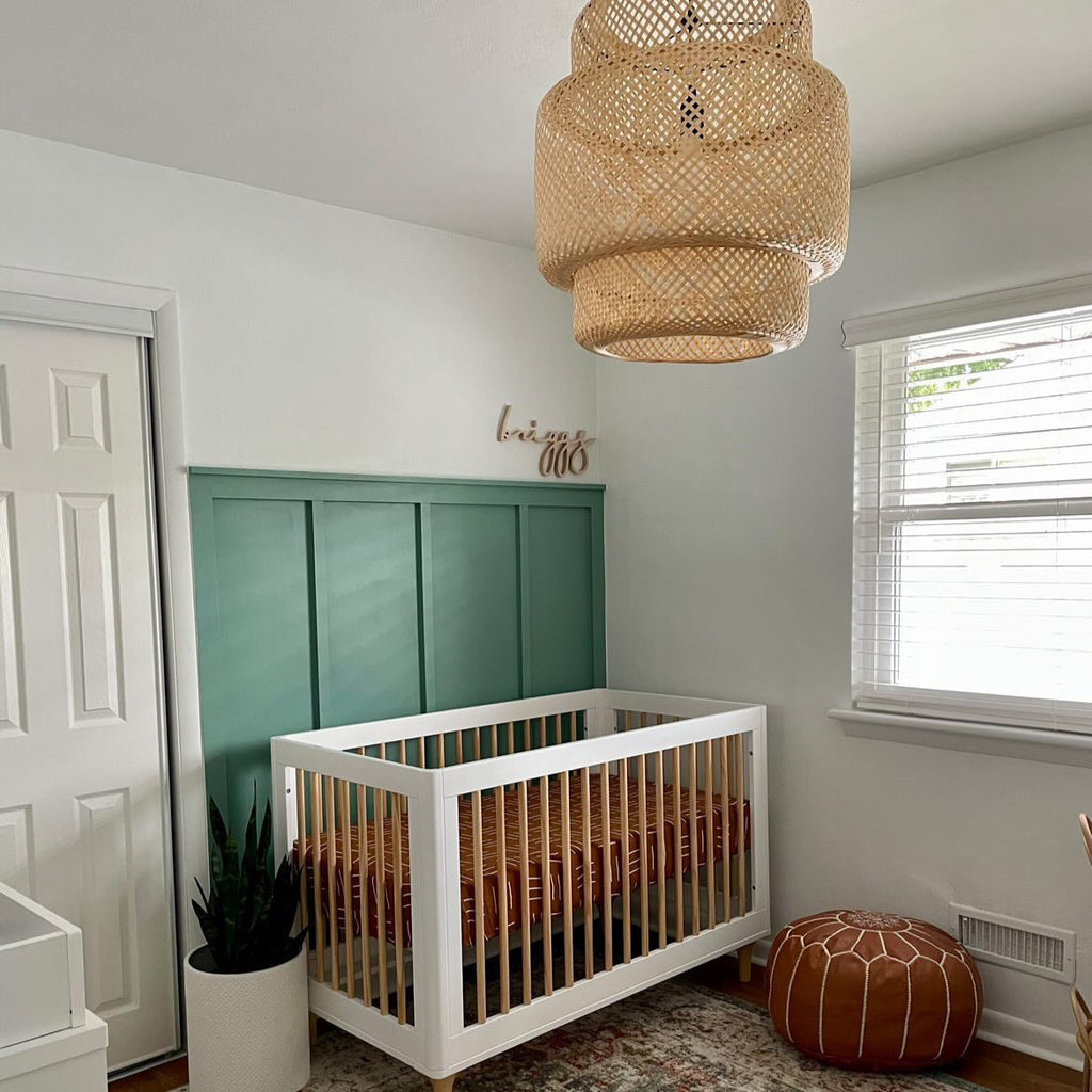 green boy nursery with wooden name sign