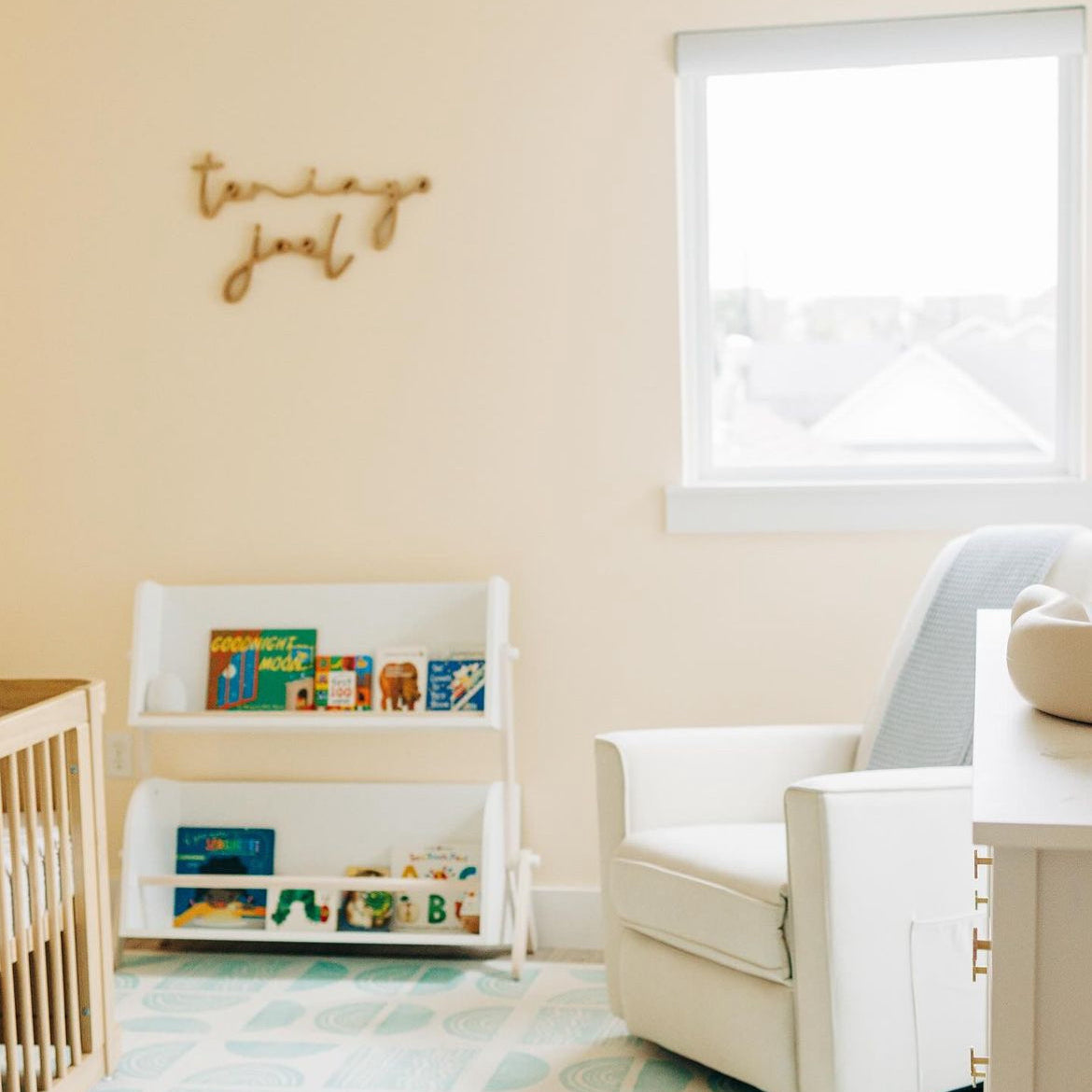 boy nursery design with cherry wood name sign
