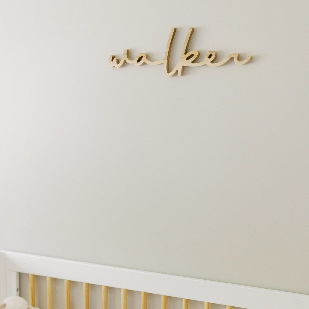 boy nursery decor with wooden name sign