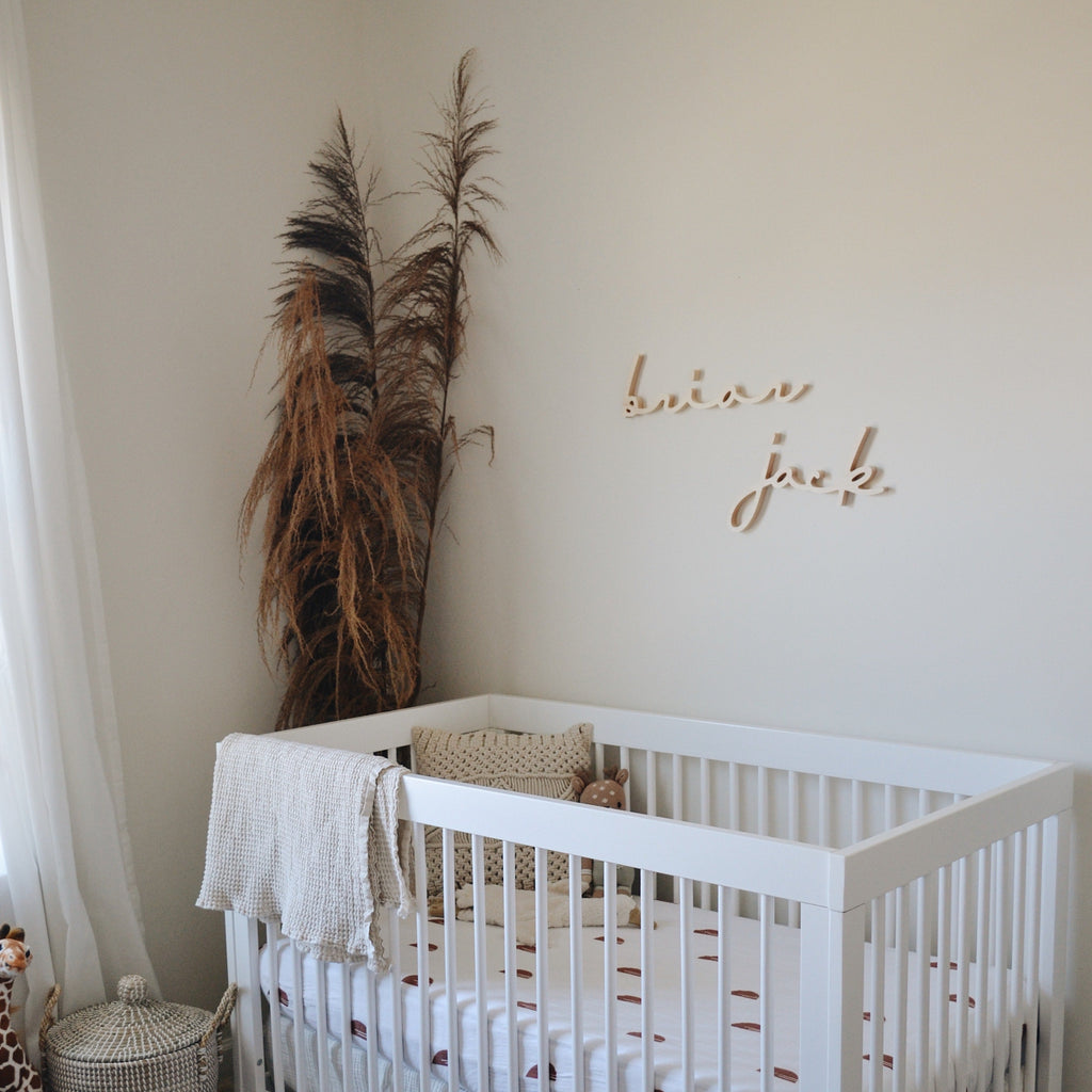 boy nursery design with name sign