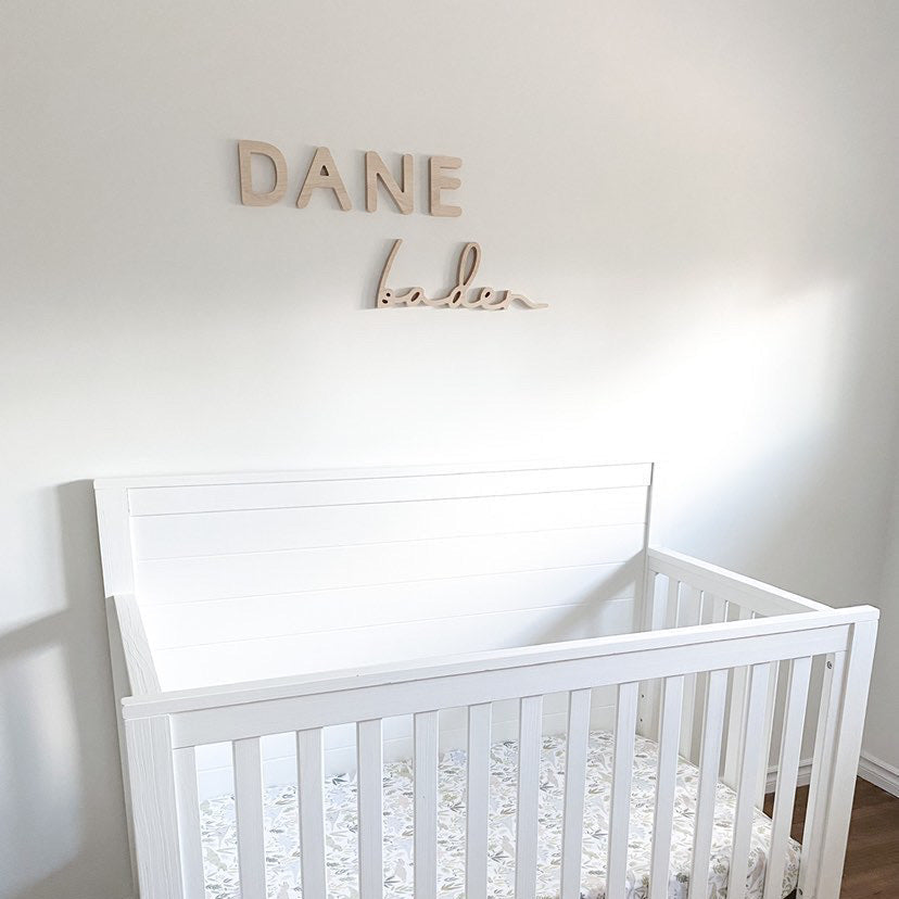 wooden name sign for a white boy nursery