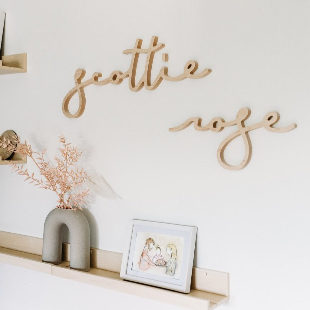 girl name sign decor in nursery