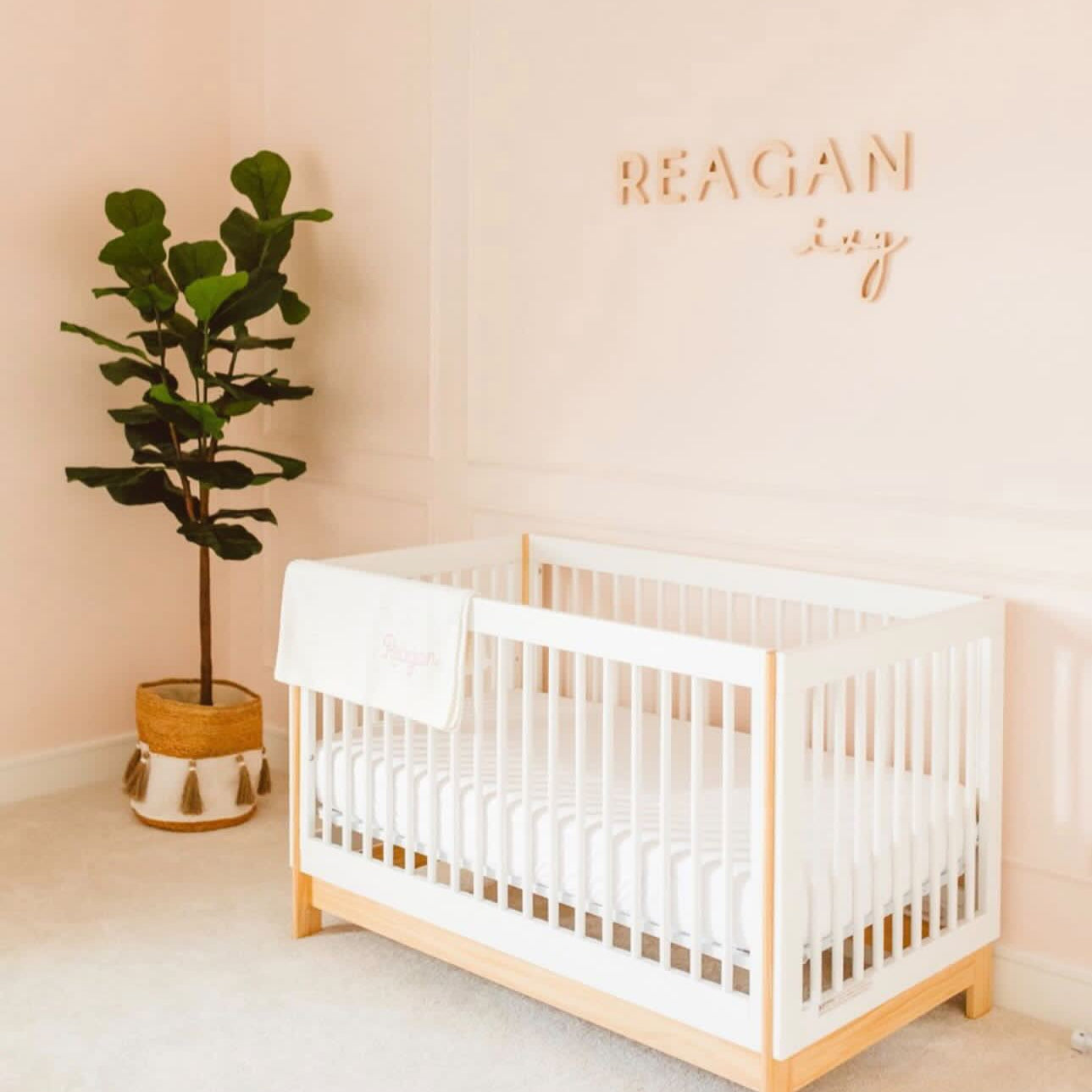 nursery name sign in pink nursery for baby girl