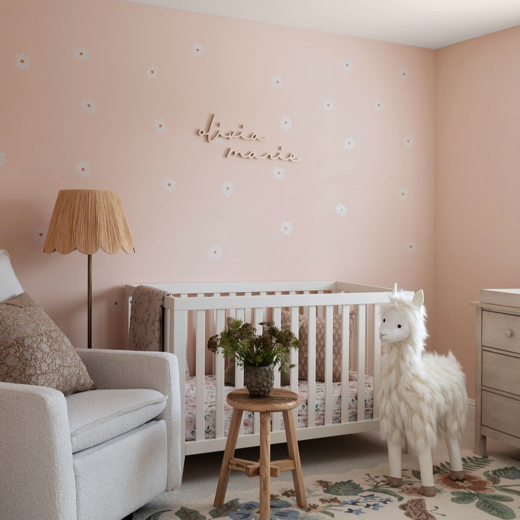 girl name sign in pink nursery